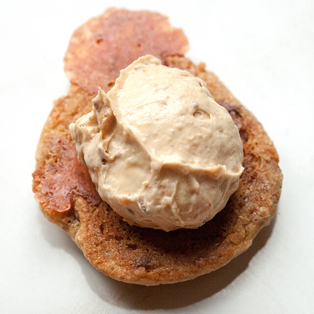 These chewy cookies are full of Butterfingers and stuffed with peanut butter buttercream; it's basically salty-sweet perfection | www.spachethespatula.com #recipe