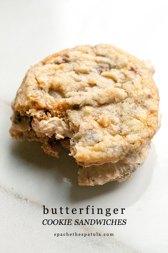 These chewy cookies are full of Butterfingers and stuffed with peanut butter buttercream; it's basically salty-sweet perfection | www.spachethespatula.com #recipe