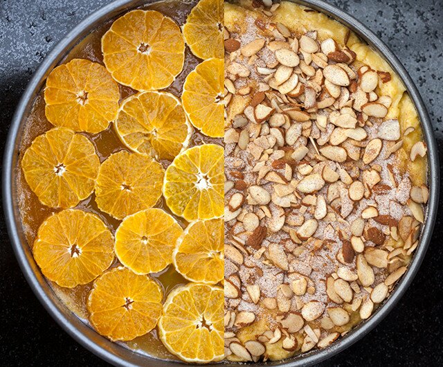 This moist and fluffy cake has a crunchy toasted cinnamon almond base, and a gooey tangelo and caramel top---it’s outrageously tasty as dessert, or breakfast! | www.spachethespatula.com #recipe