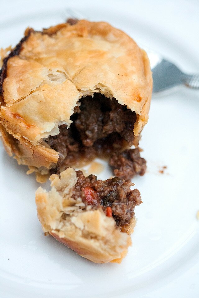 Buttery, flakey hand pies filled with the best beef and Guinness beer filling! Perfect for St. Patrick's Day! | www.spachethespatula.com #recipe