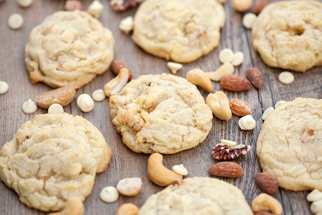 Super chewy cookies full of roasted mixed nuts and white chocolate | www.spachethespatula.com #recipe